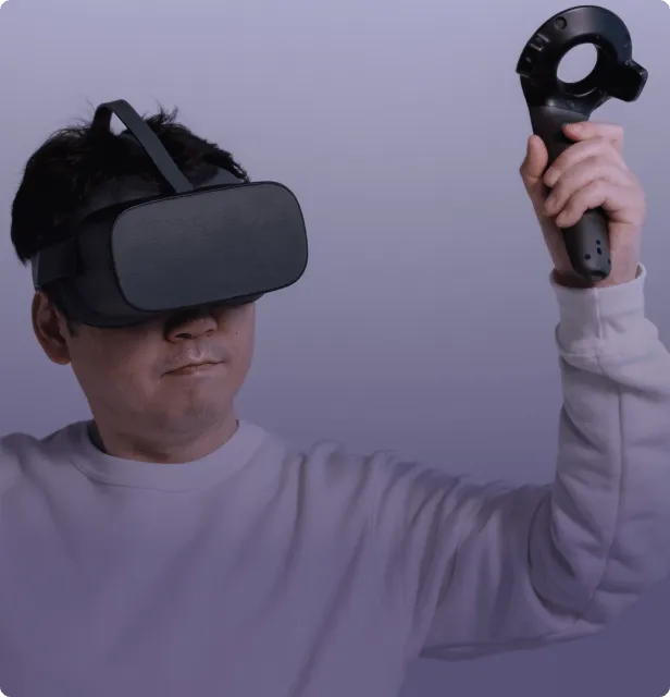 A man using a VR headset.